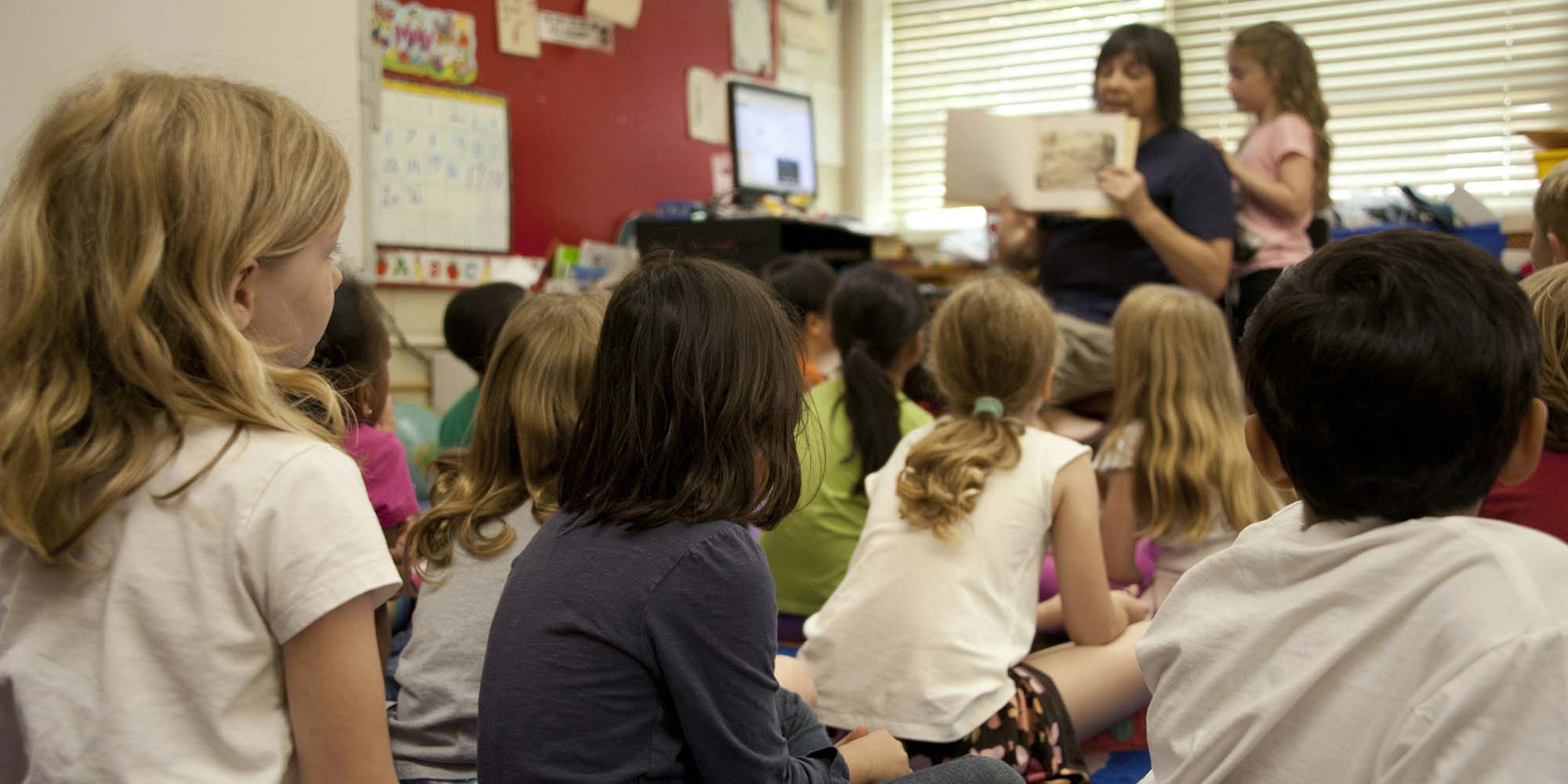 teacher reading to classroom